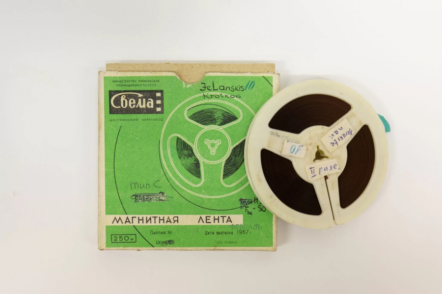 Audiocassette from the MHM collection next to a green packaging box