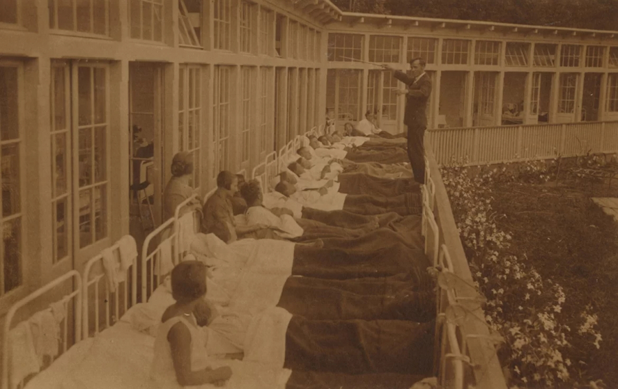 The sunbathing porch with patients built in 1927 near the Krimulda sanatorium
