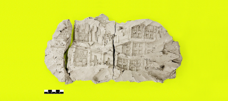 Shoe print fossil on a neon yellow background.